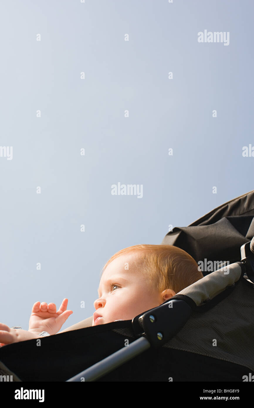 Baby in push chair Stock Photo Alamy