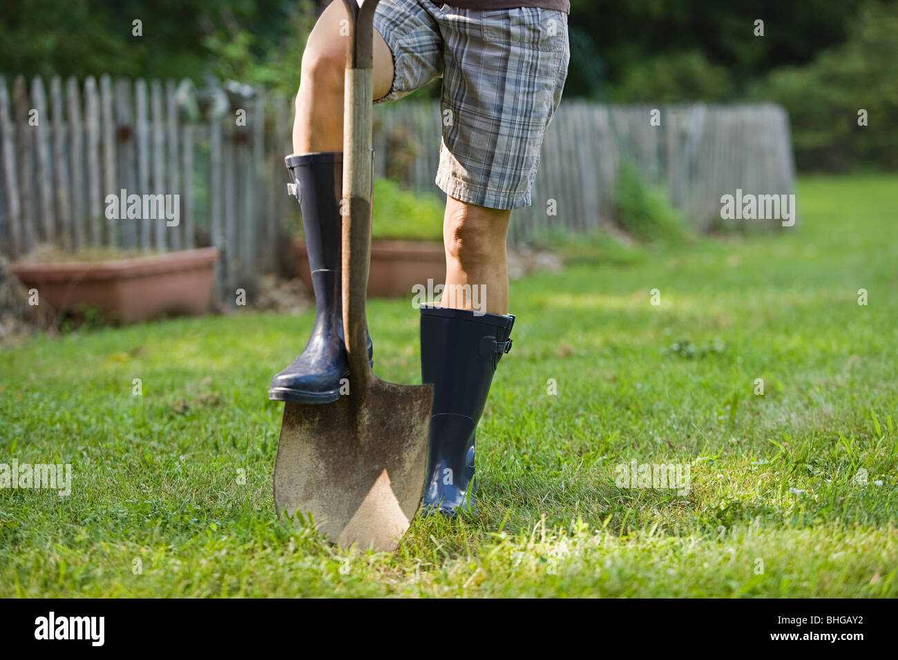 Gardener with spade Stock Photo