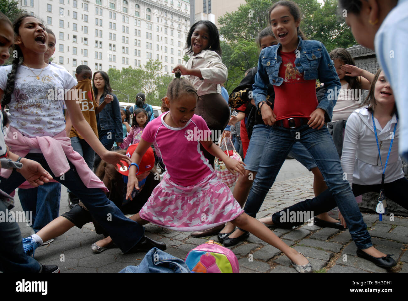 New York City School children waiting for bus to take them home Stock Photo