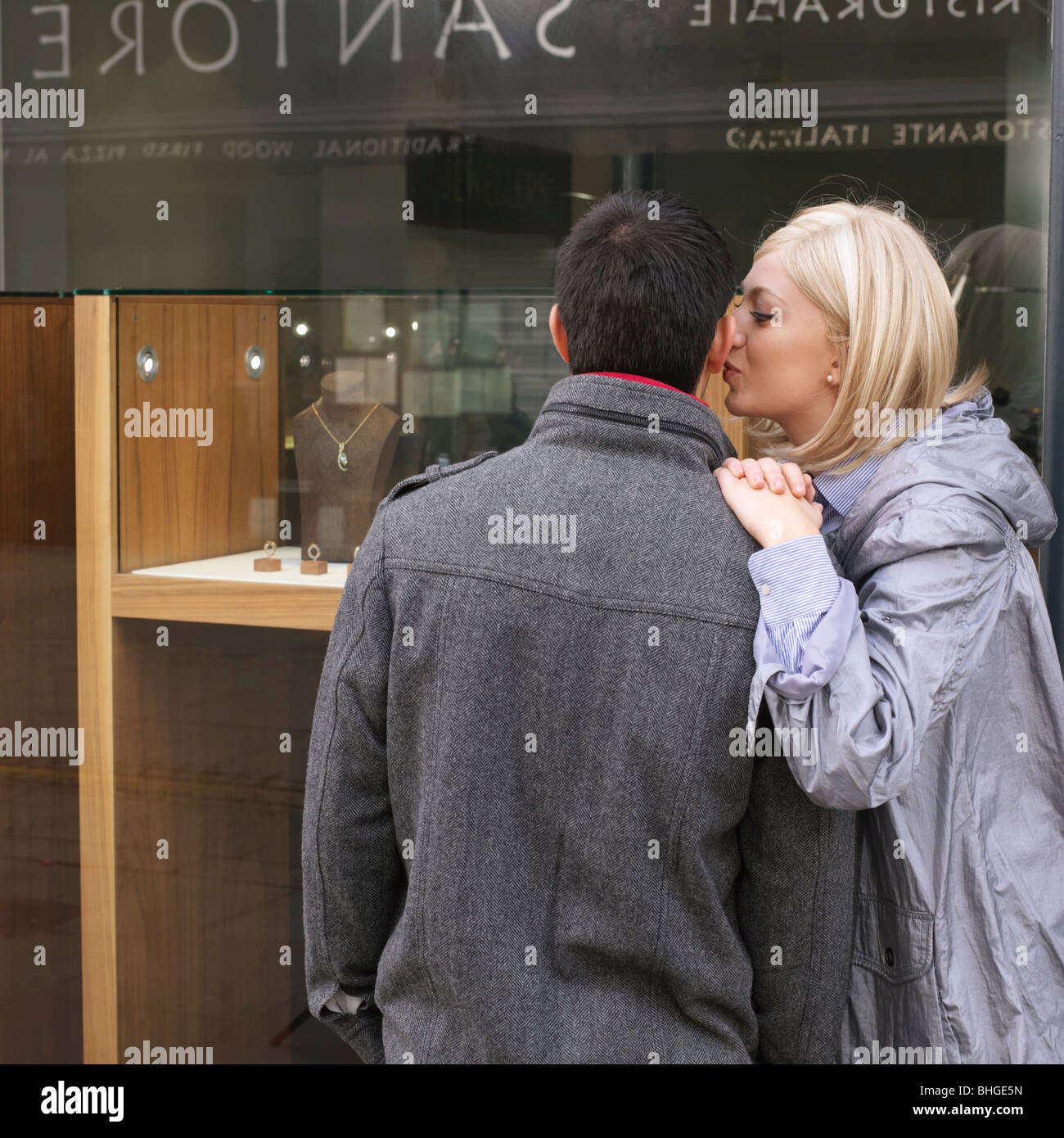 woman kissing man Stock Photo - Alamy