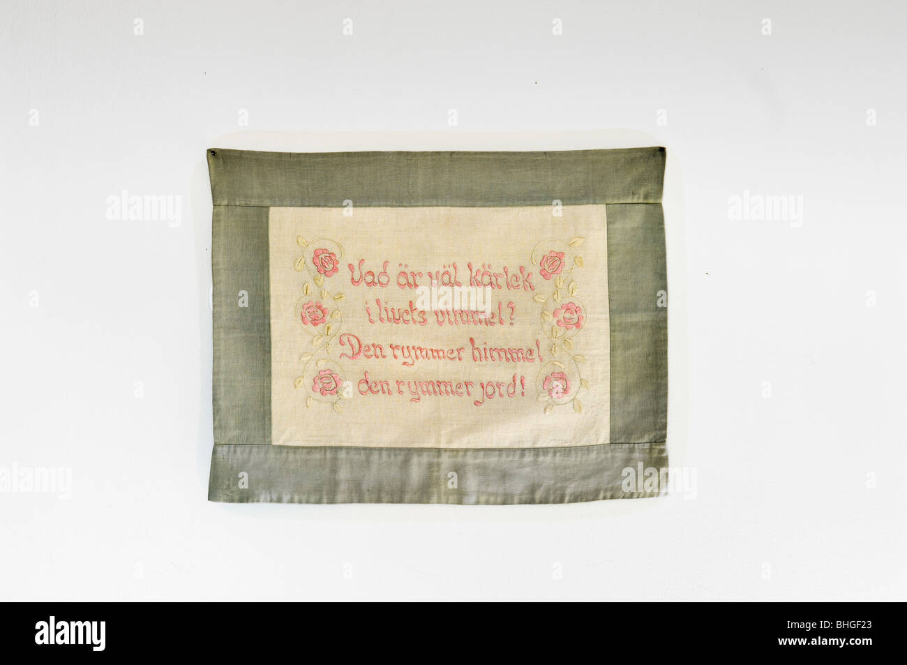 Embroidered message on a wall hanging, Sweden Stock Photo - Alamy