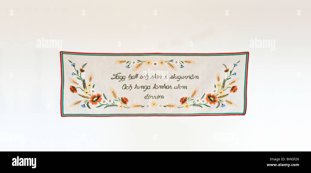 Embroidered message on a wall hanging, Sweden Stock Photo - Alamy