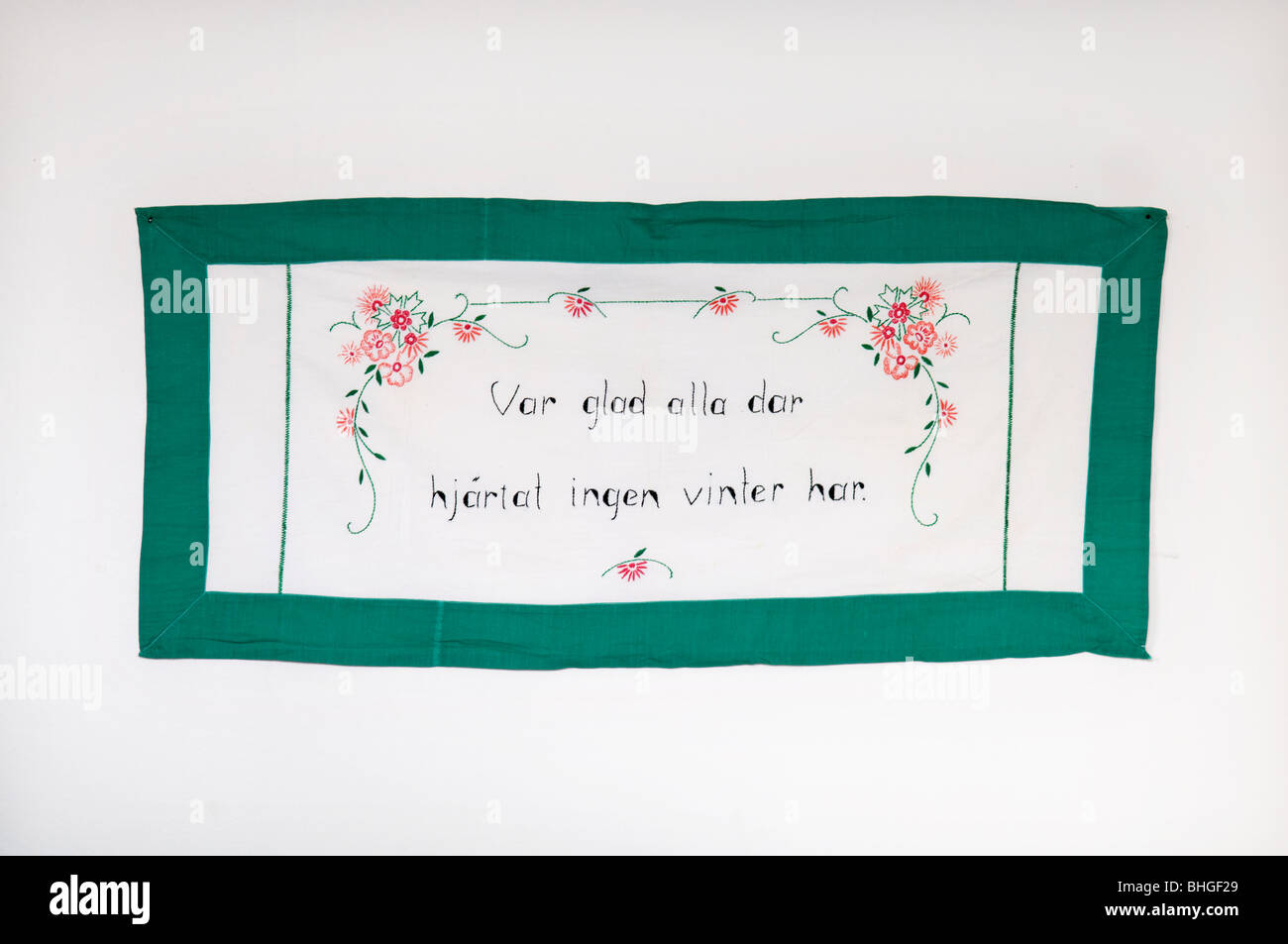 Embroidered message on a wall hanging, Sweden Stock Photo - Alamy