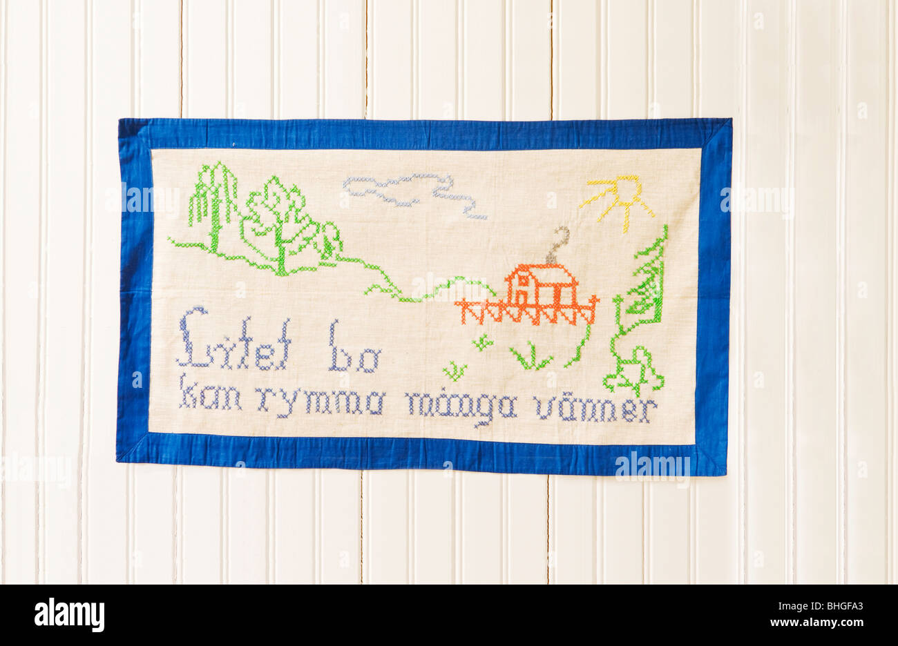 Embroidered message on a wall hanging, Sweden Stock Photo - Alamy