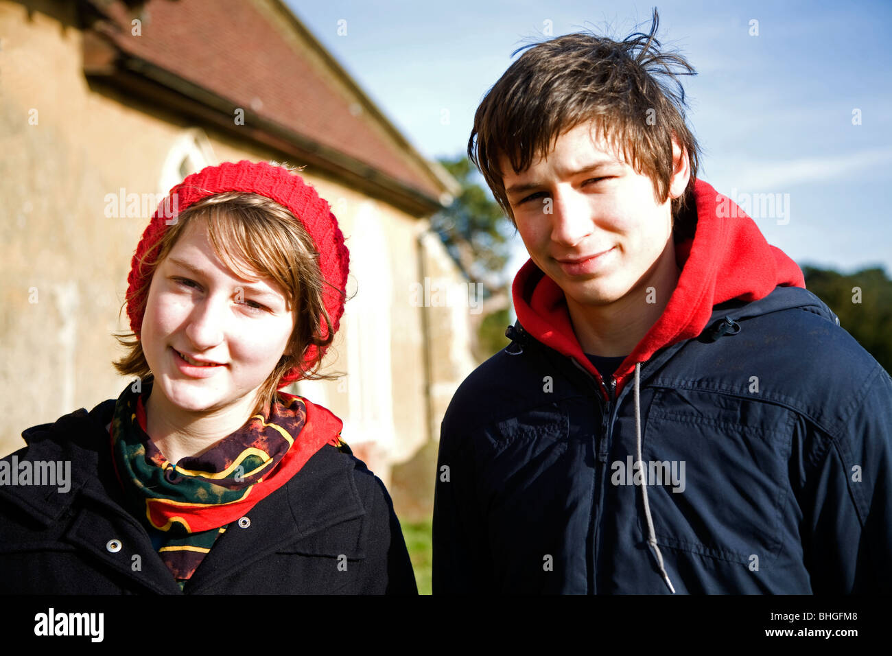 Male and female teenage twins outdoors in winter clothing Stock Photo
