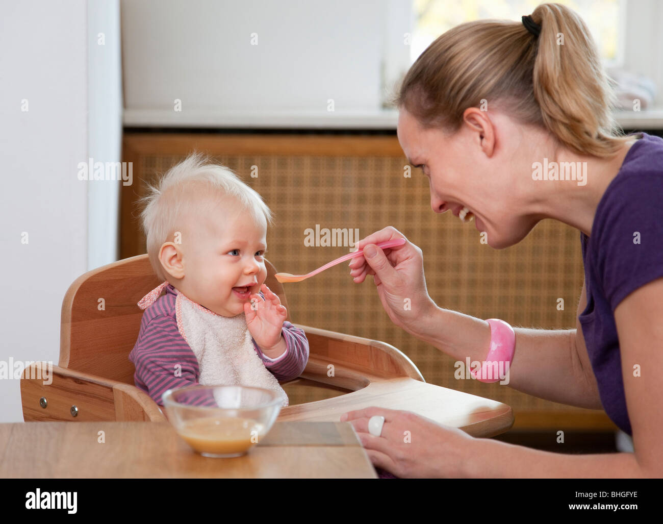 mother feeding baby Stock Photo Alamy