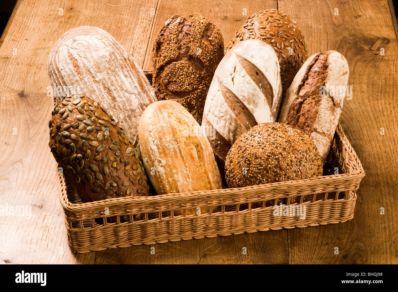 Various types of bread in a basket Stock Photo Alamy