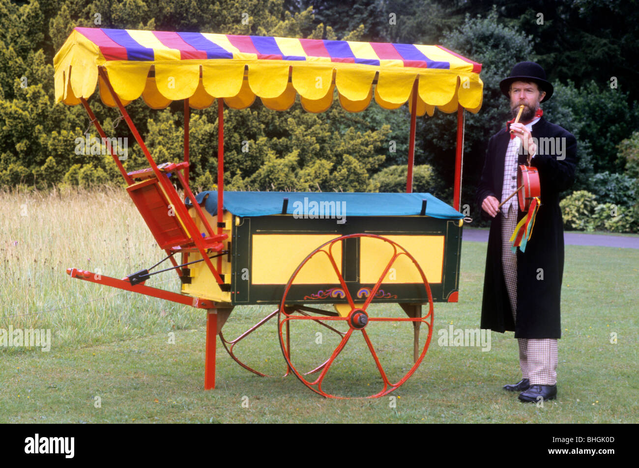 Victorian historical re-enactment, itinerant musician entertainer and show wagon musical music entertainment entertainer Stock Photo