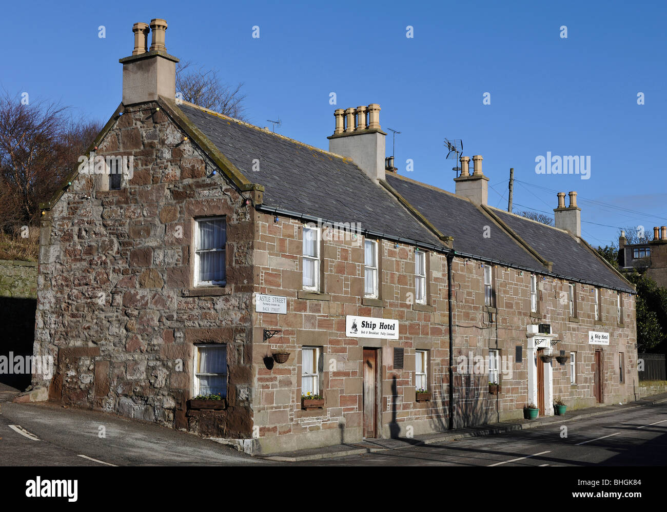 Johnshaven, Aberdeenshire, Scotland, UK; view of Ship Hotel, Castle