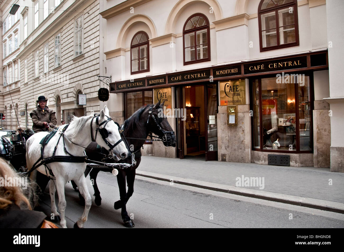 A Viennese Fiaker horse carriage outside Cafe Central on the corner of Herrengasse and Strauchgasse in central Vienna Stock Photo