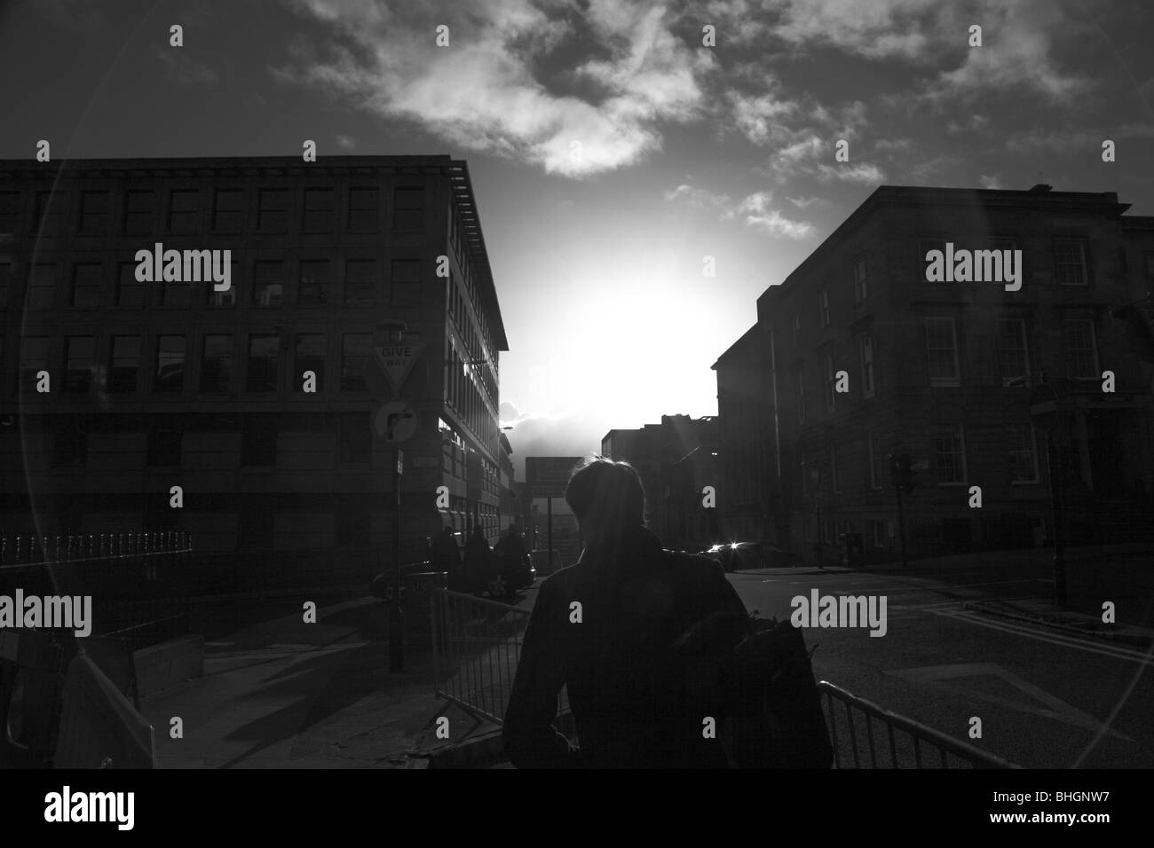 Man walking in to the light Stock Photo