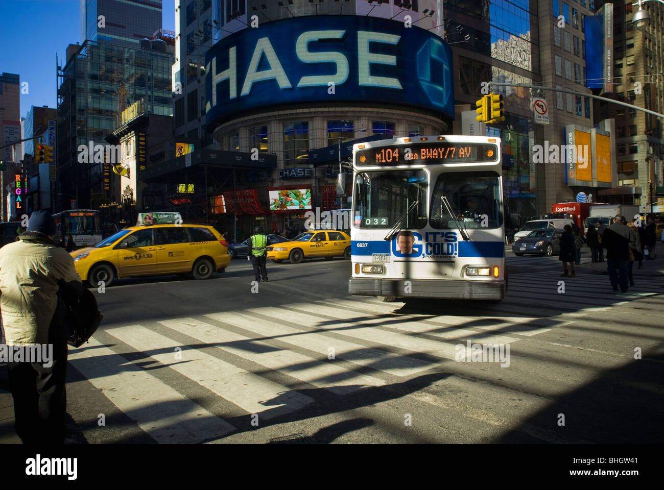 A bus travels through Times Square on Friday, February 12, 2010