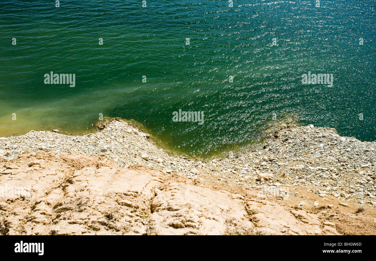Lake between mountains in a sunny day Stock Photo - Alamy