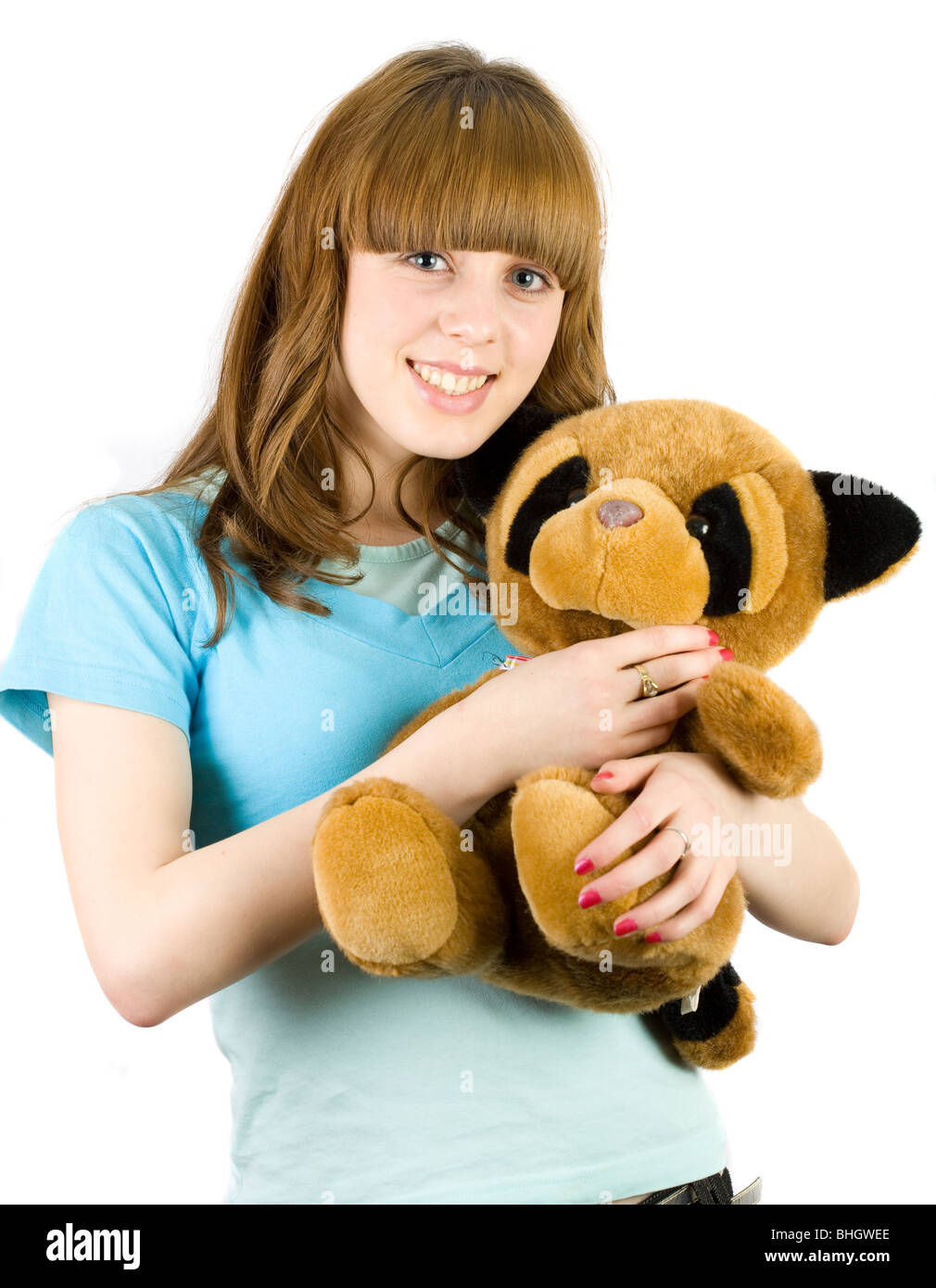holding a stuffed animal