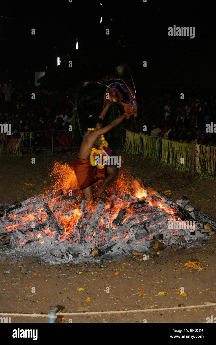 Exclusive & Very rare photograph of Agnikavadi,Agnikkavady,Agnikavady  ( Fire Walk ) . Clear view of Burning Legs of Devotee Stock Photo