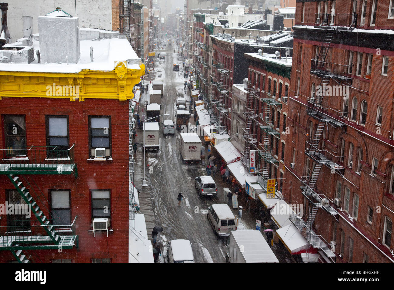 Mott Street in Chinatown during a snow storm,, New York City Stock Photo