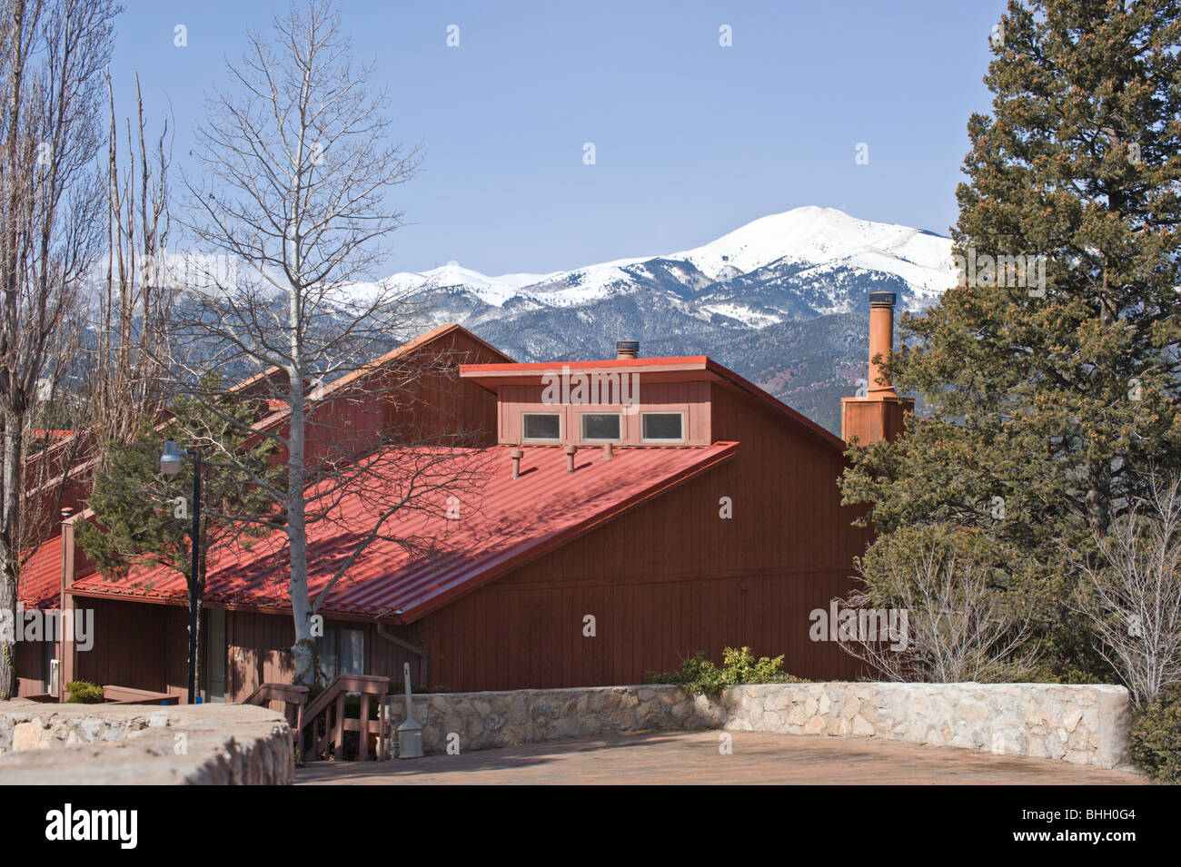 Underneath A Blue Sky Snowcapped Sierra Blanca Overlooks A