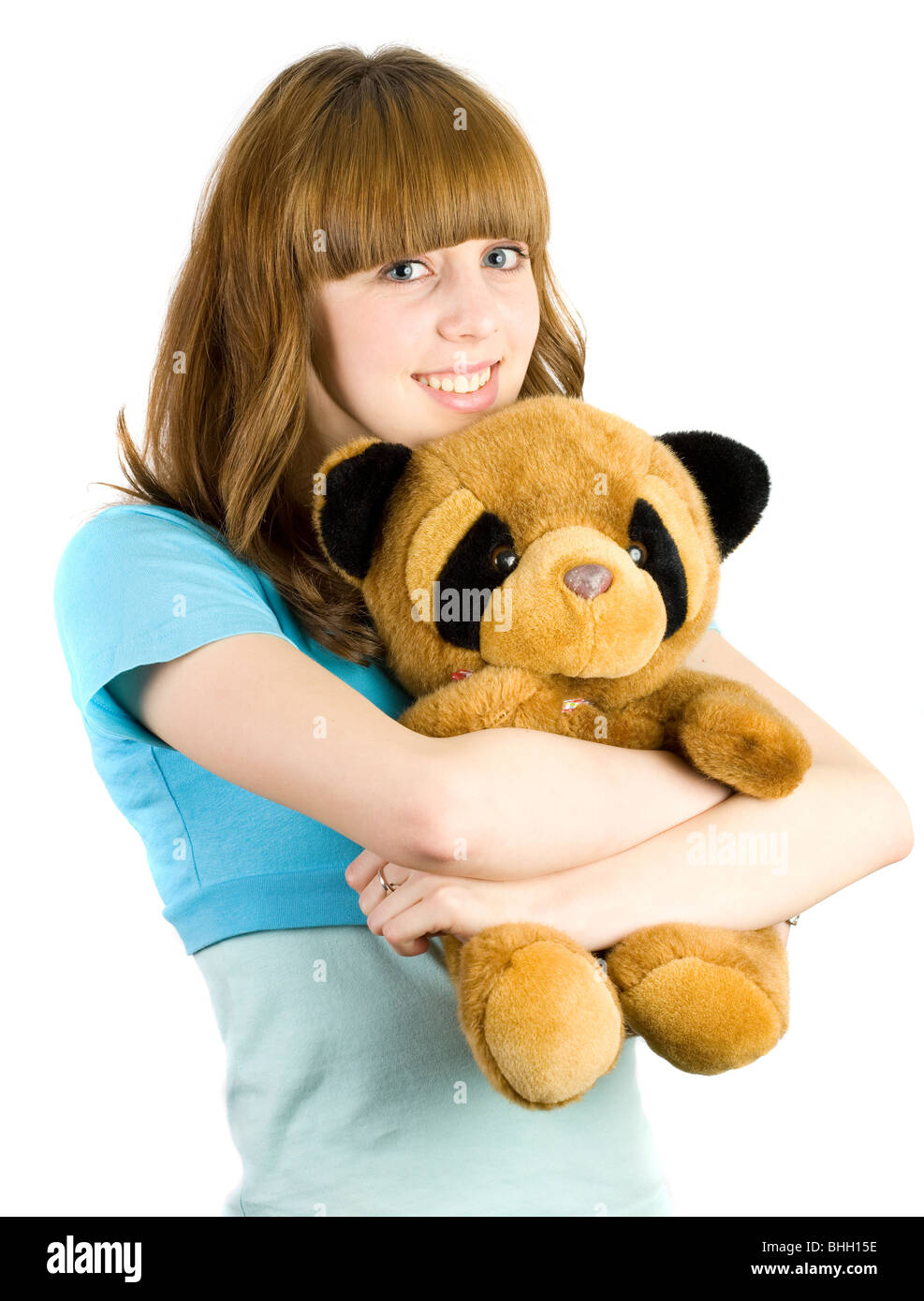 holding a stuffed animal