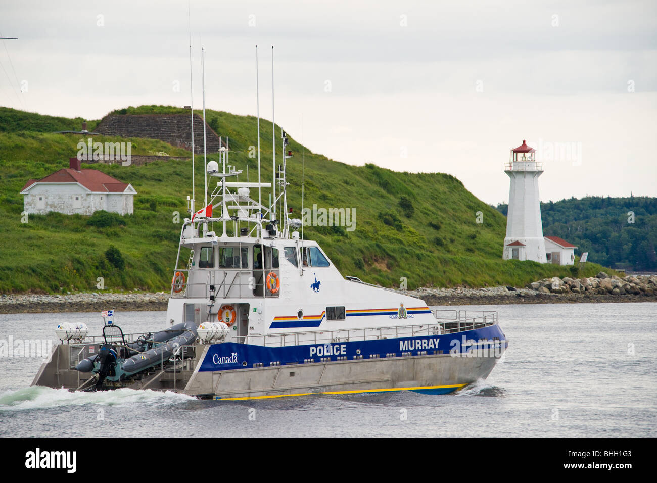 RCMP patrol boat Murray in Halifax Harbour passing George's Island. Stock Photo