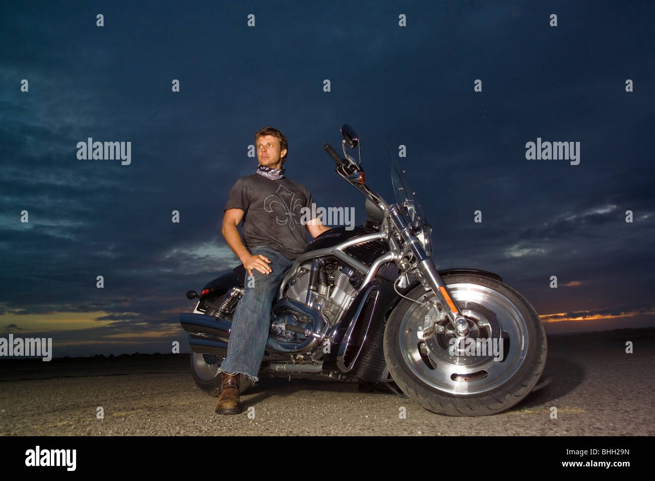 3631 Karem on HD Man sitting on Harley Davidson V Rod Black Chrome