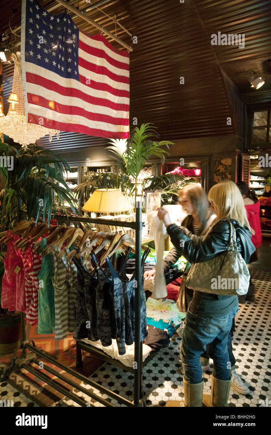 Customers buying clothes at Hollister clothes store, Bluewater
