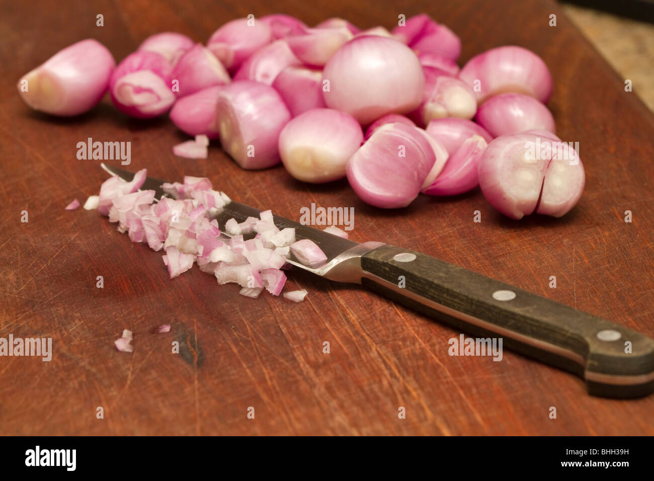 Peeled shallots ready for chopping Stock Photo