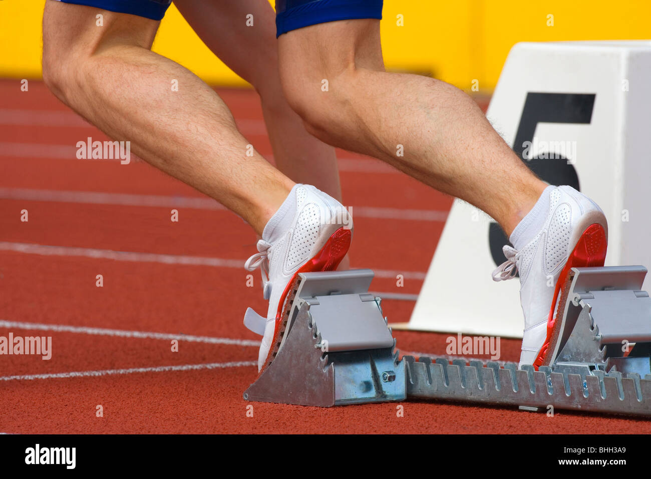 sport runner at starting block in running competition Stock Photo Alamy
