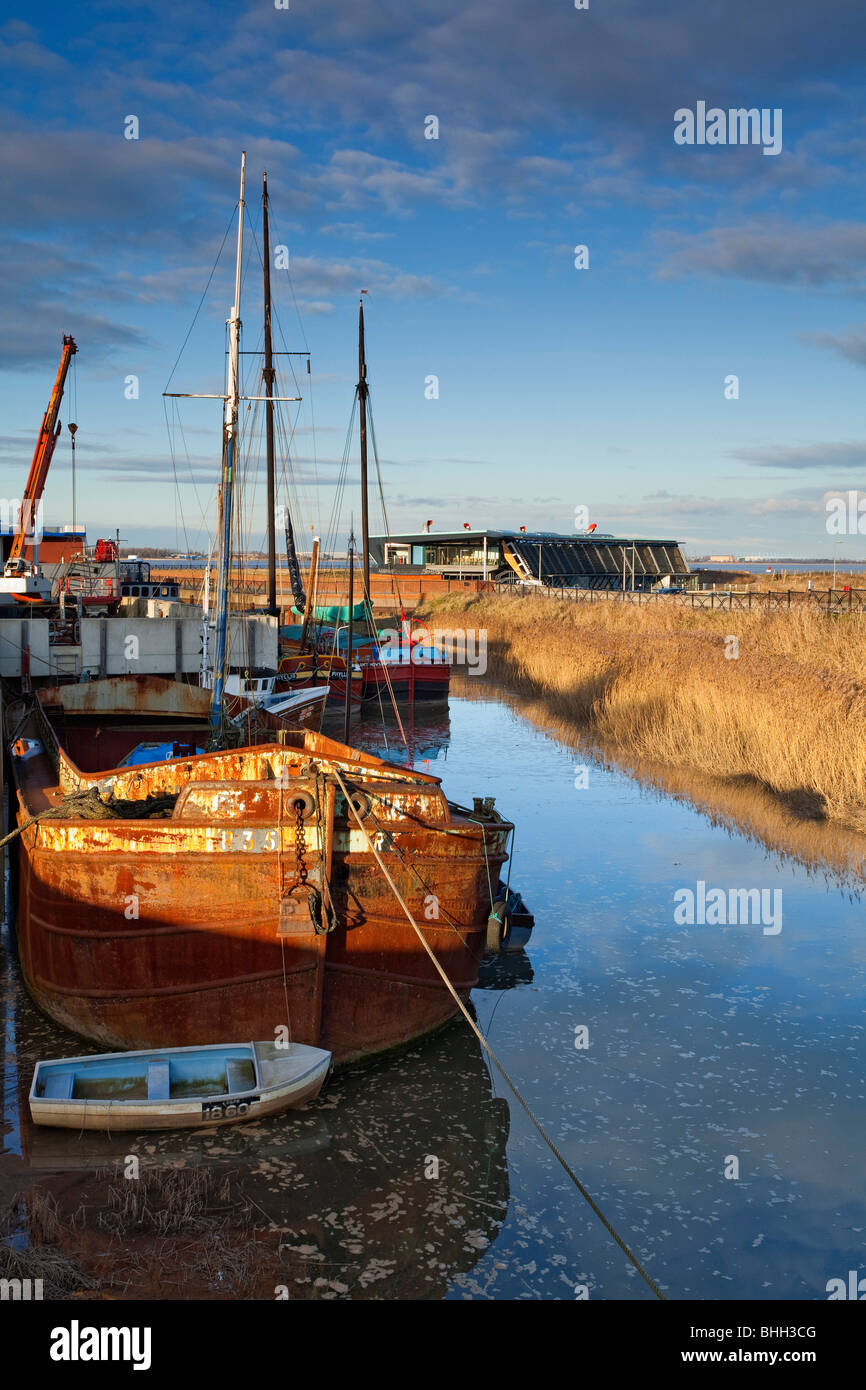 Boats moored up on an inlet next to the River Humber at Barton-upon-Humber in North Lincolnshire Stock Photo