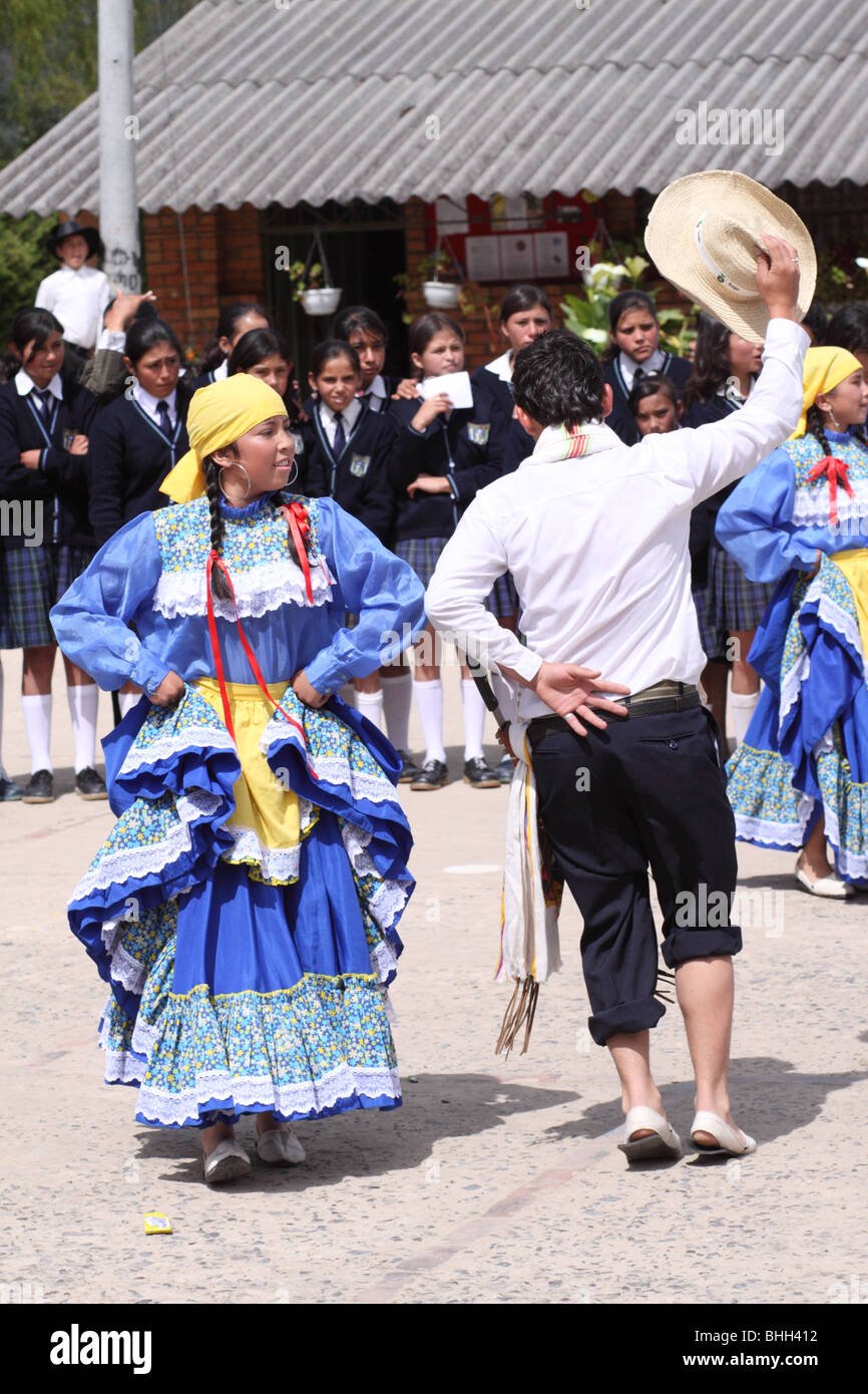 students of a rural school performing folkloric dances in the courtyard ...