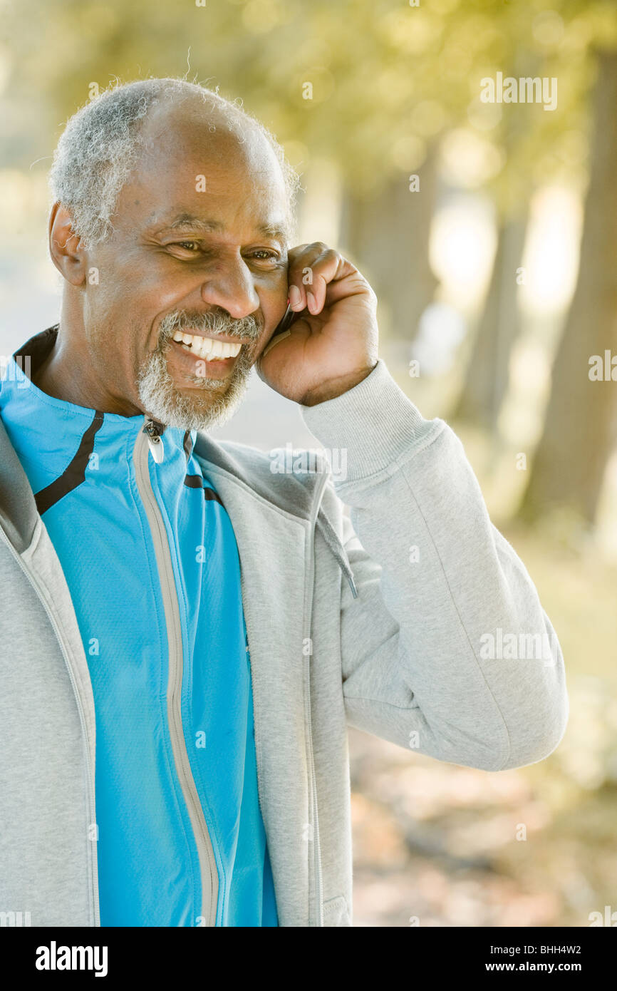 Senior man using a mobile phone, Sweden. Stock Photo