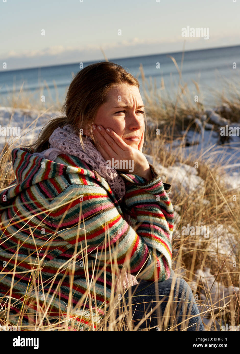 Portrait of a woman by the sea, Sweden. Stock Photo