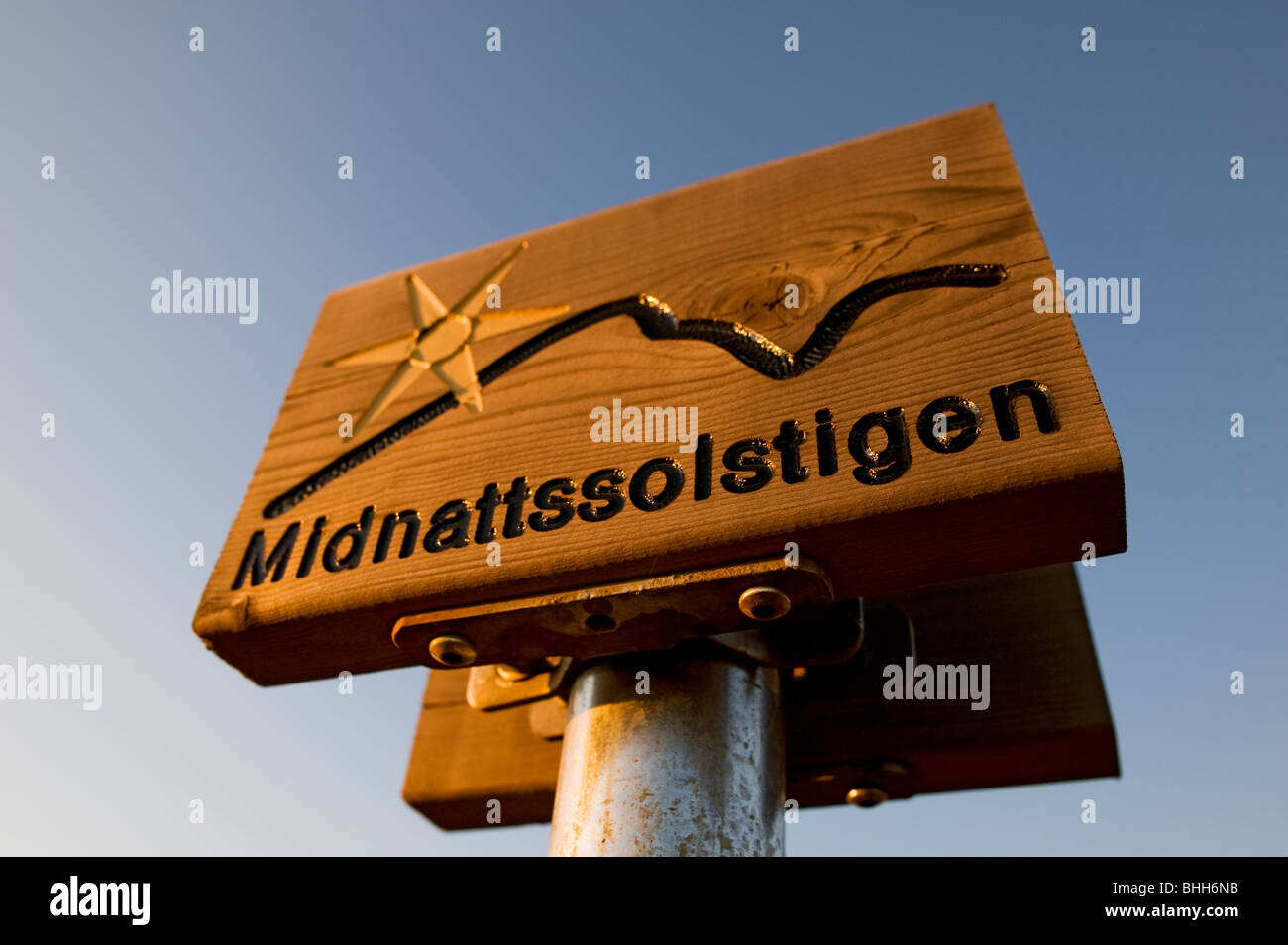 A wooden sign against the sky, Sweden. Stock Photo