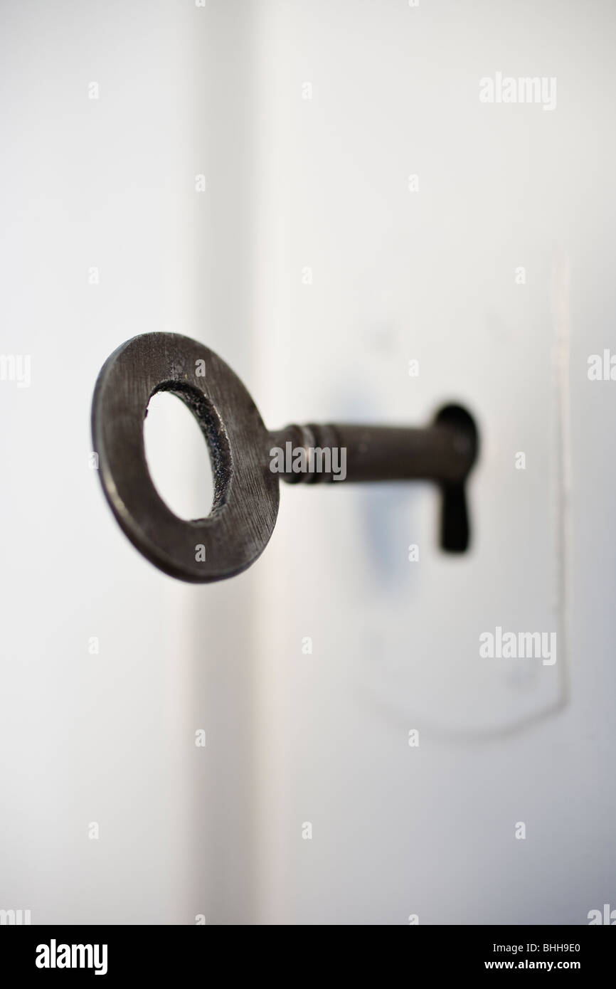 An old key in a door, Sweden. Stock Photo