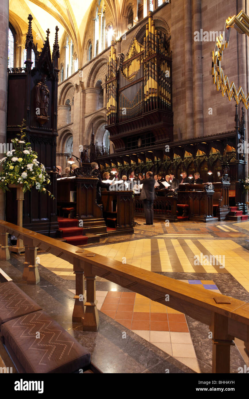 The Choir at Hereford Cathedral,the organ overlooks the practicing choir and choir stalls. Stock Photo