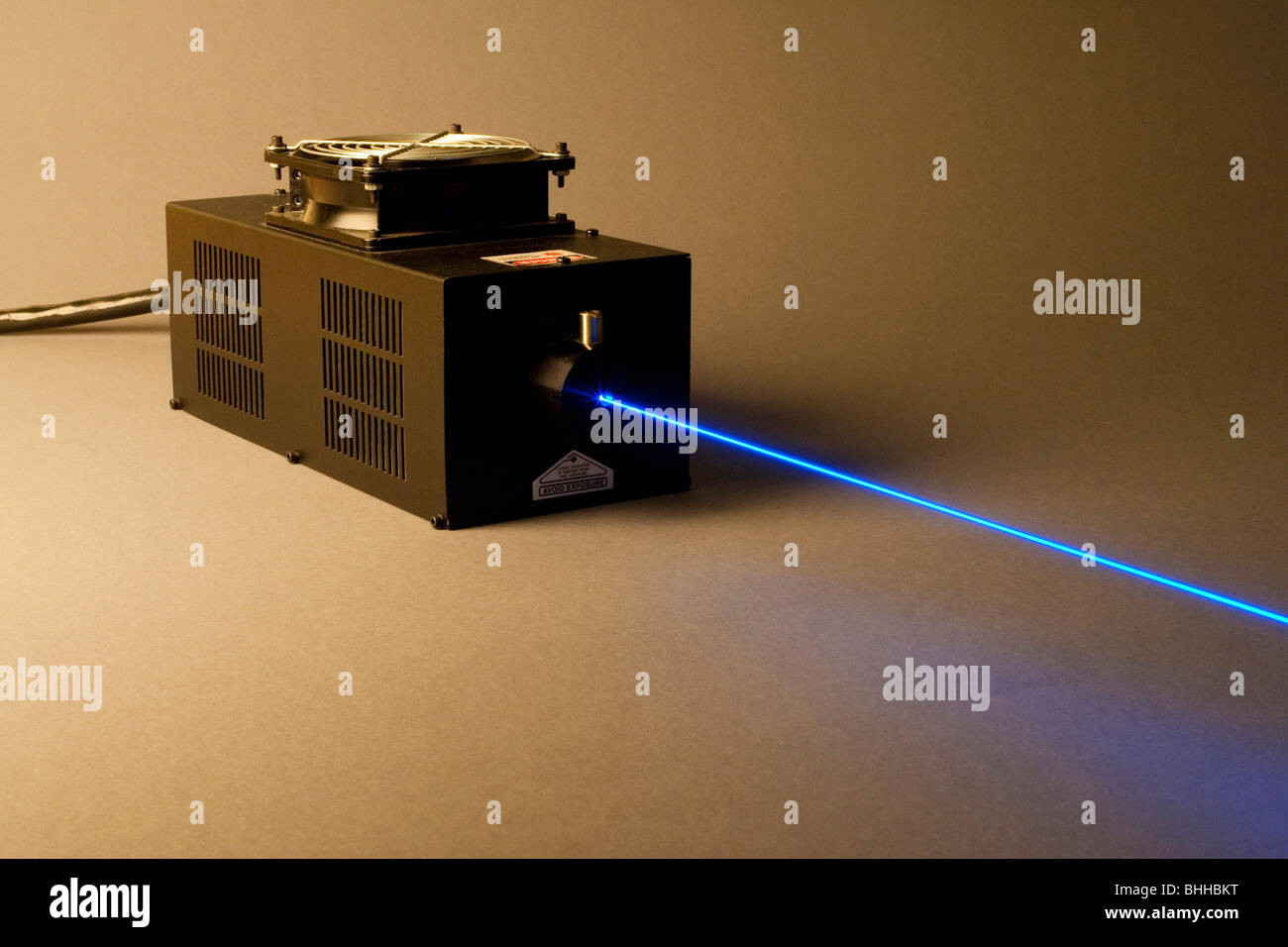 argon ion gas laser producing blue 488nm wavelength beam Stock Photo