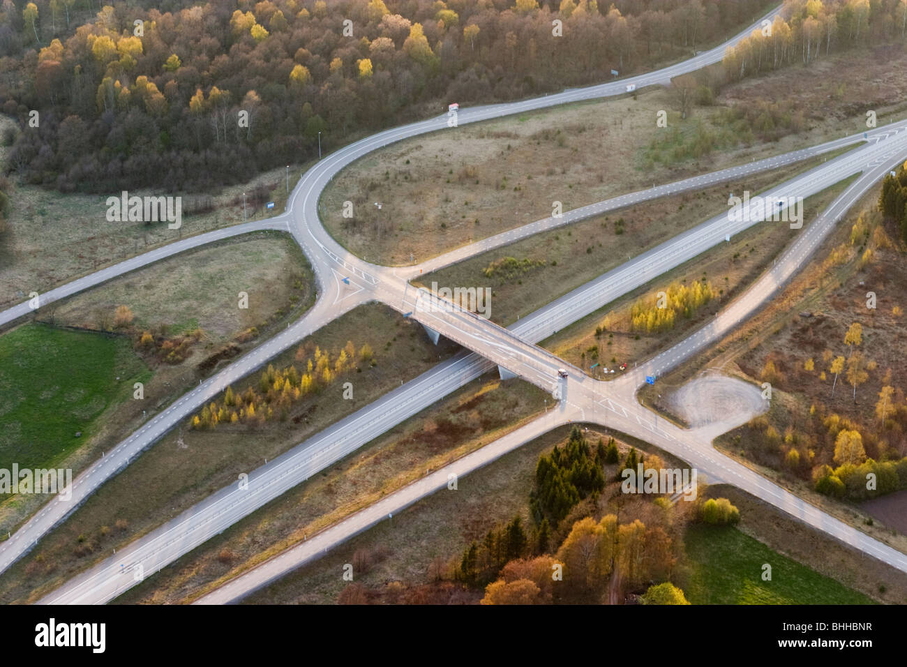Country roads and crossing, aerial view, Skane. Stock Photo