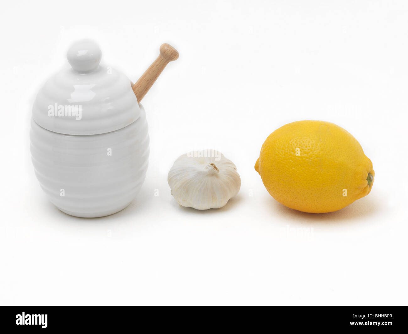 Cold Cure Lemon Garlic and Pot of Honey Stock Photo Alamy