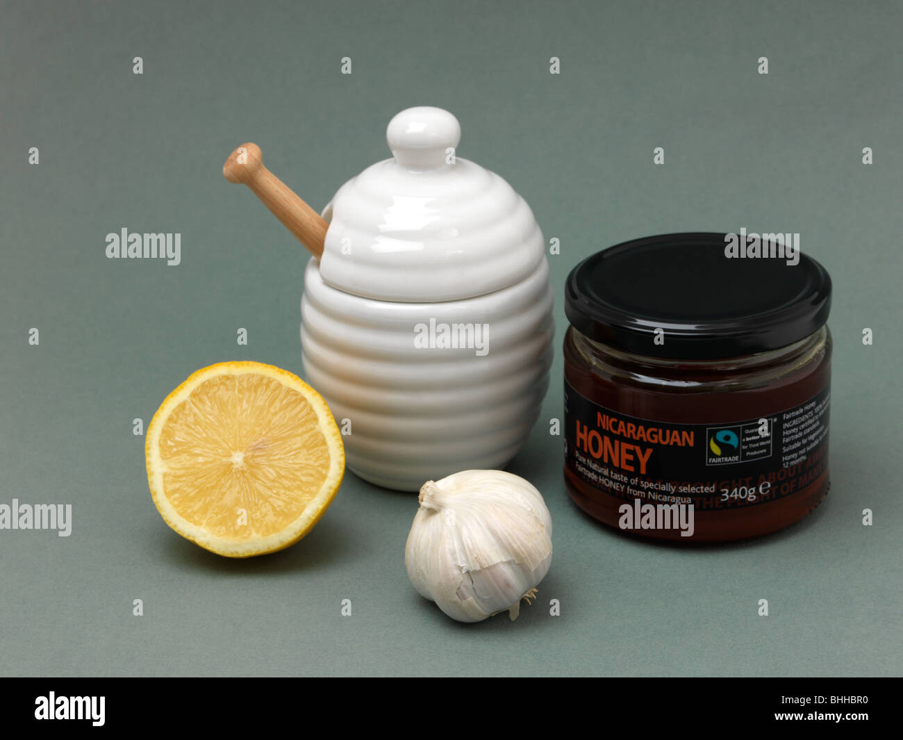 Cold Cure Lemon Garlic and Pot of Honey Stock Photo Alamy