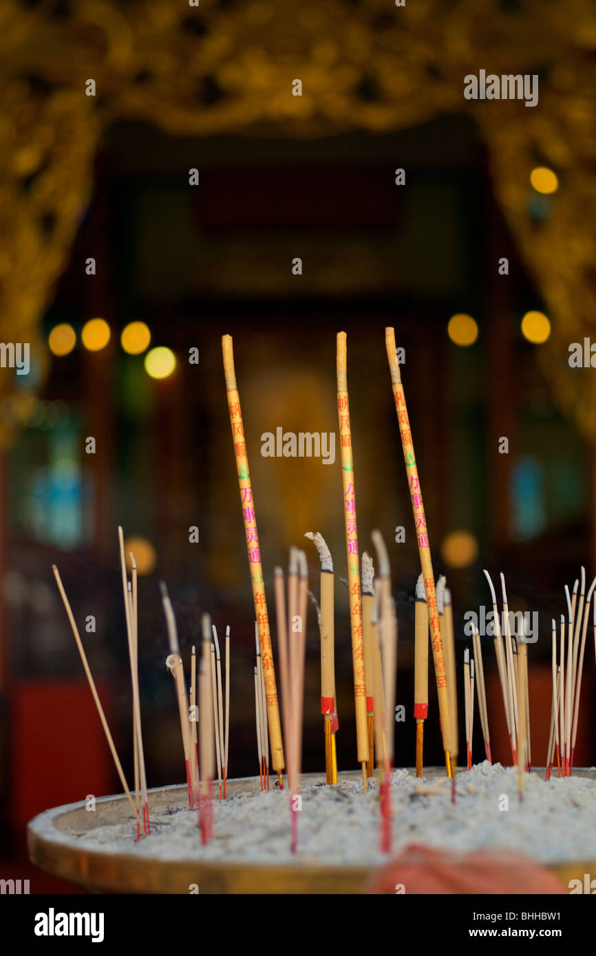 Incense sticks burning in a temple in Bangkok Thailand Stock Photo - Alamy