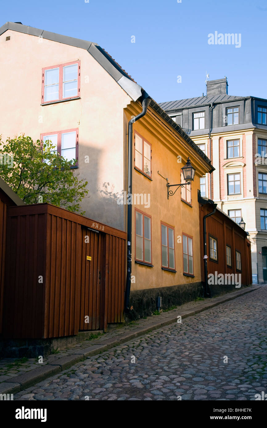 Old houses by cobble stone, Sweden. Stock Photo