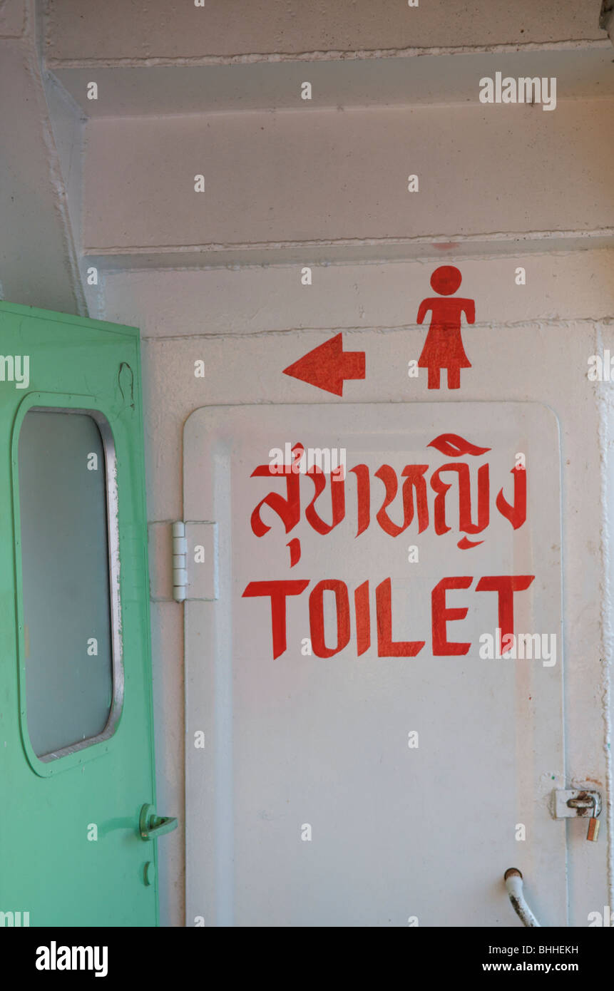 Ladies toilet written in Thai and English on Ferry to Donsak from Koh Phangan Stock Photo
