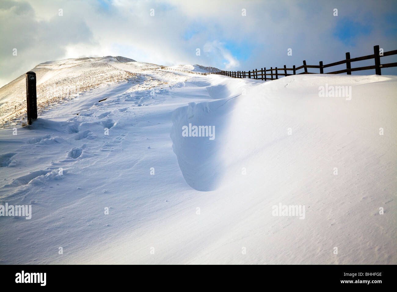 Horizontal photograph of the path leading to Mam Tor in the snow, Peak District National Park Stock Photo