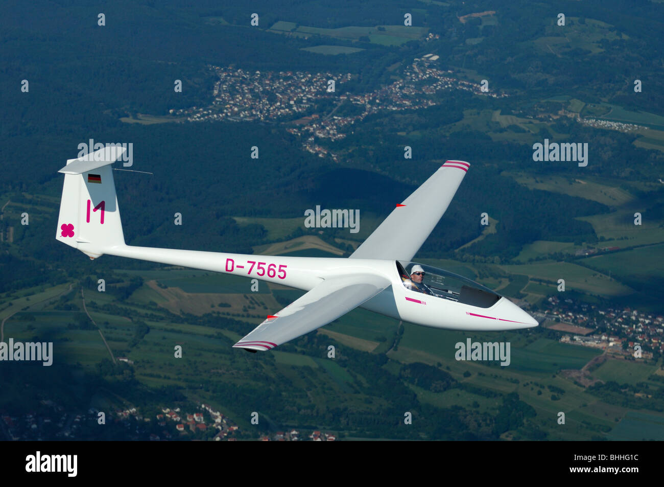 Single seat glider Asw 19b in flight over Saarland countryside - Germany Stock Photo