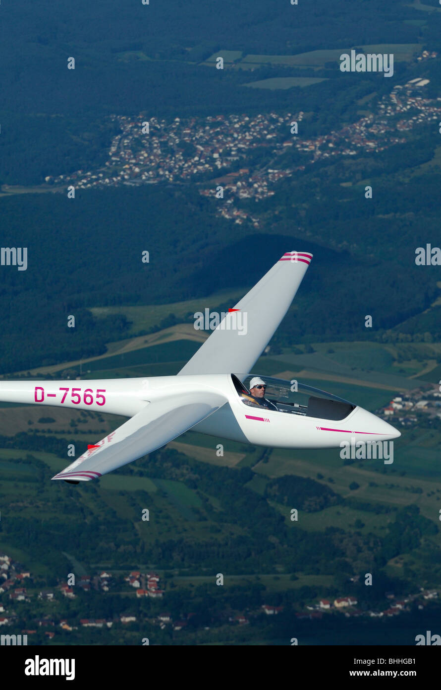 Single seat glider Asw 19b in flight over Saarland countryside - Germany Stock Photo