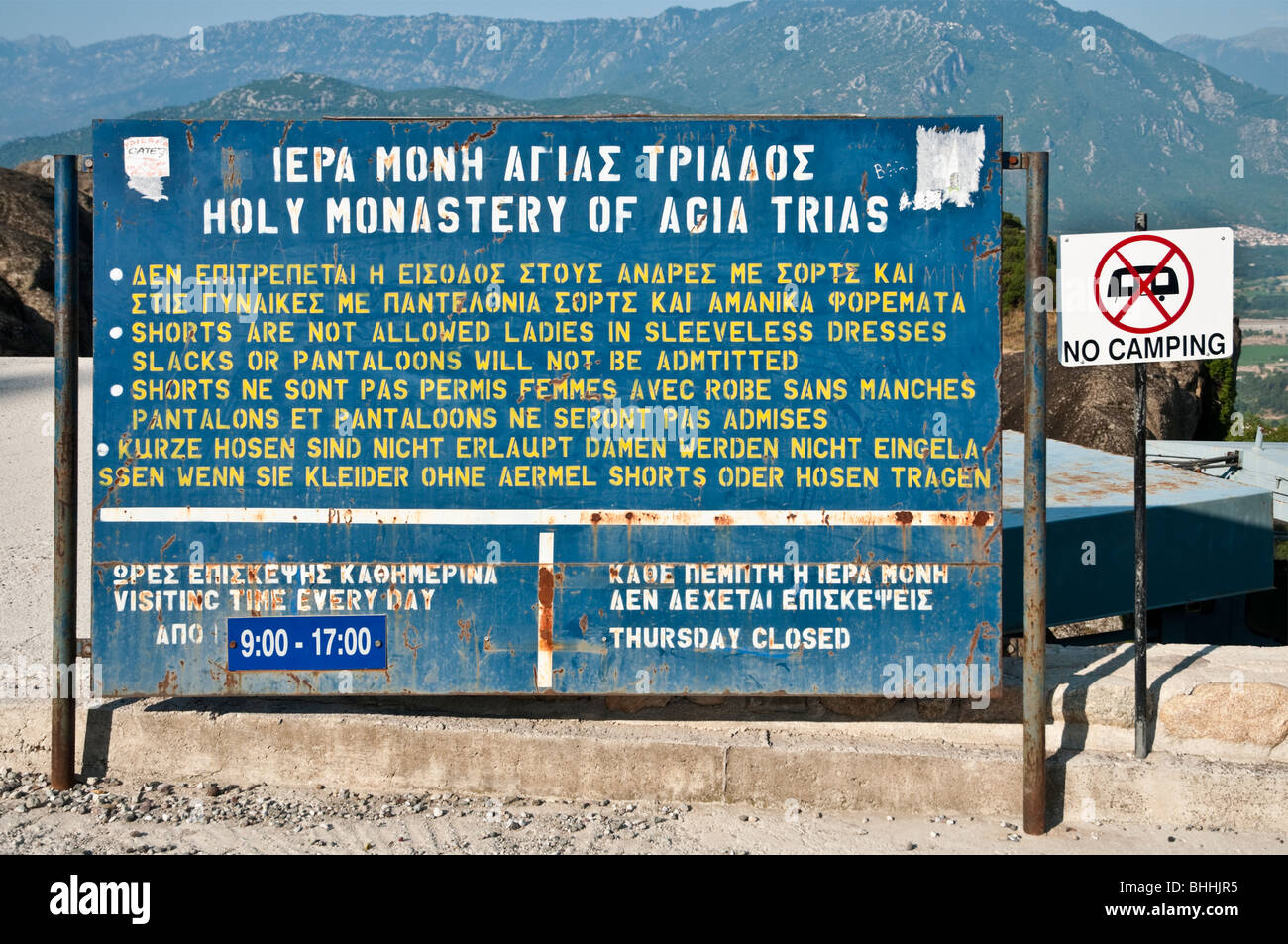 Dress code sign for visitors outside the monastery of Aghia Triada in the  Meteora, Thessaly, central Greece Stock Photo - Alamy