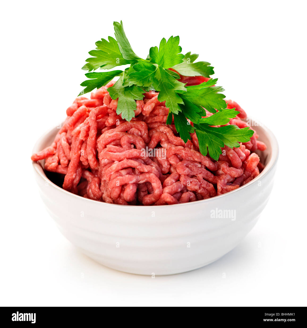 Close up on isolated bowl of lean red raw ground meat Stock Photo