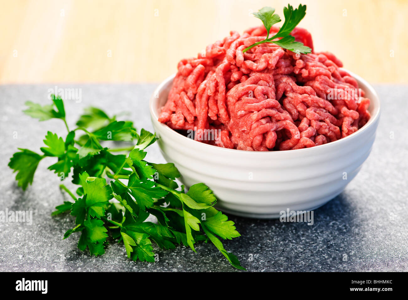 Close up on bowl of lean red raw ground meat Stock Photo