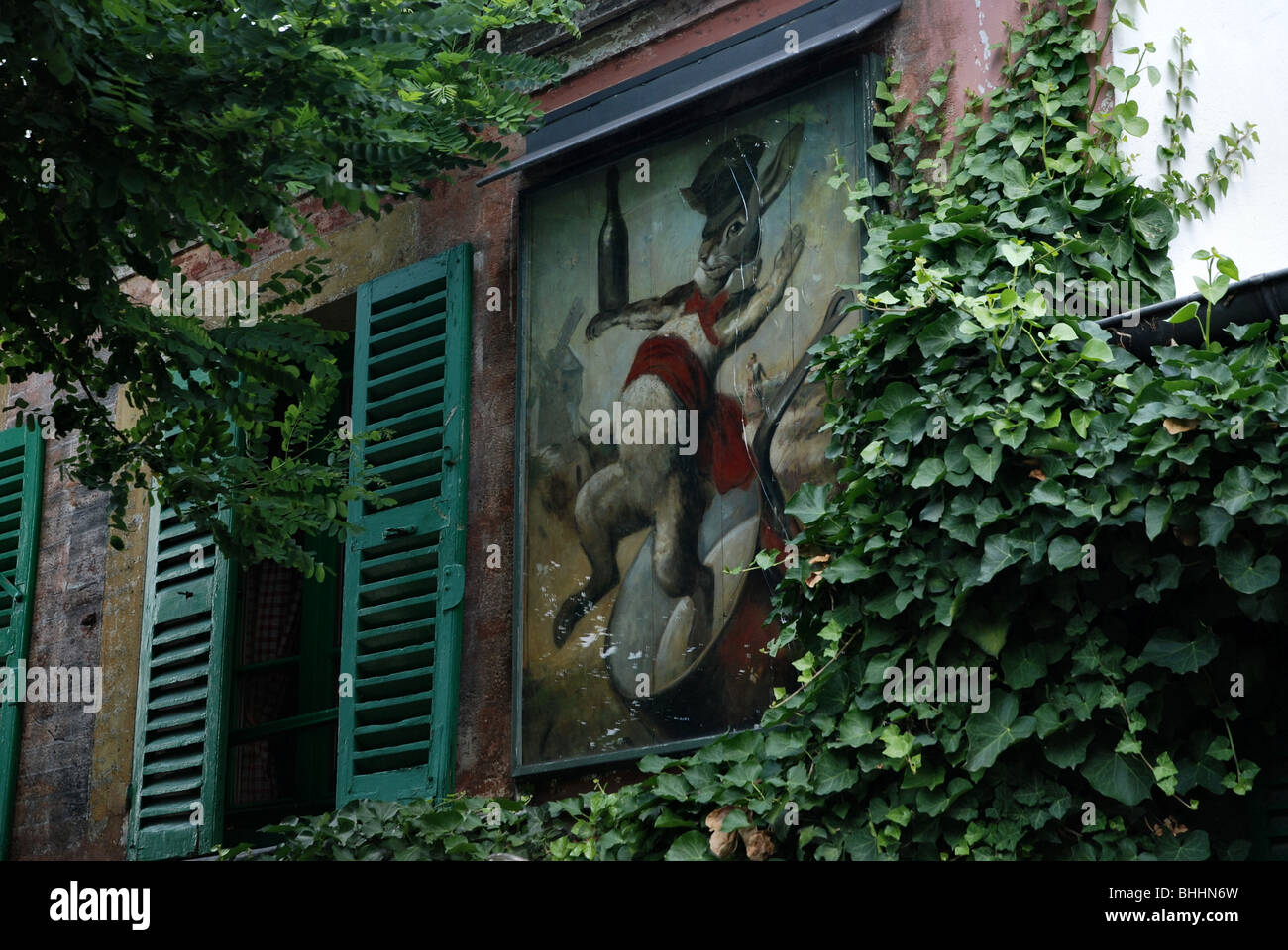 Painting  of a rabbit (lapin in French) on the wall of  'Au Lapin Agile' Cabaret in Montmartre Paris Stock Photo