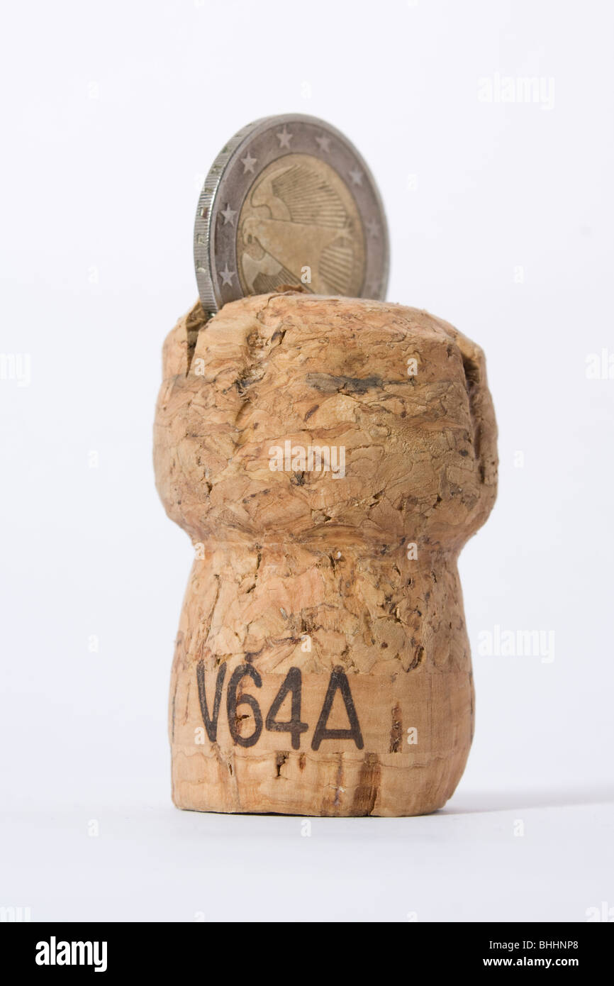 Coin embedded in a cork stopper Stock Photo