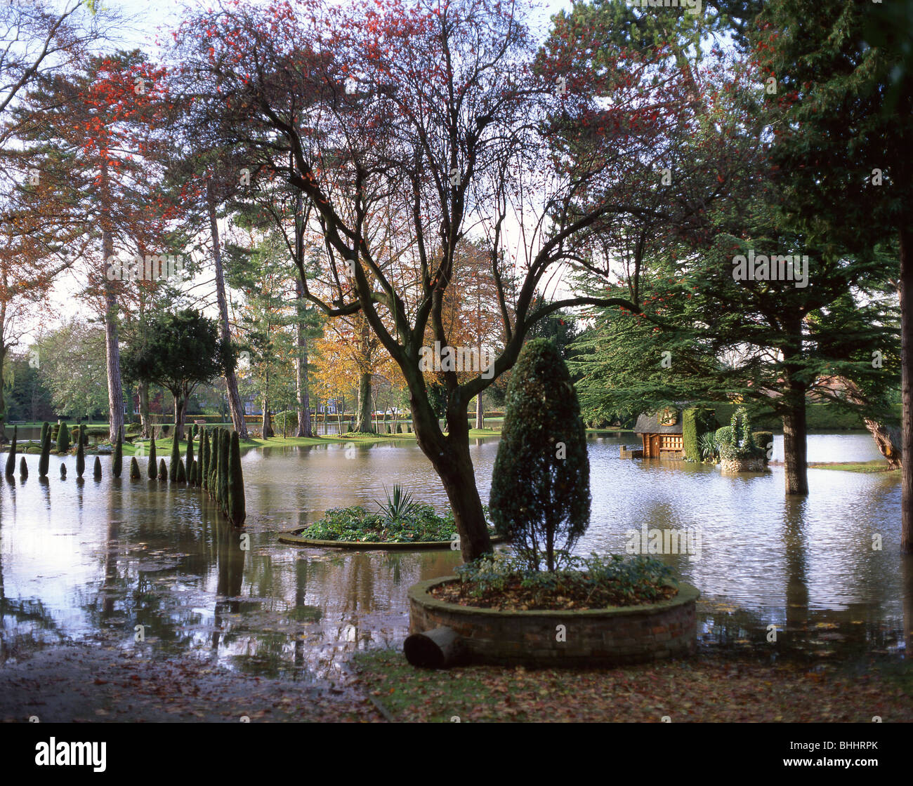 Flooded garden by River Thames, near Cookham, Berkshire, England, United Kingdom Stock Photo